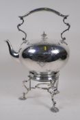 A large C19th silver plated spirit kettle on stand with cast supports, 38cm high