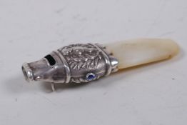 An antique white metal mounted mother of pearl teether/whistle, 7cm long