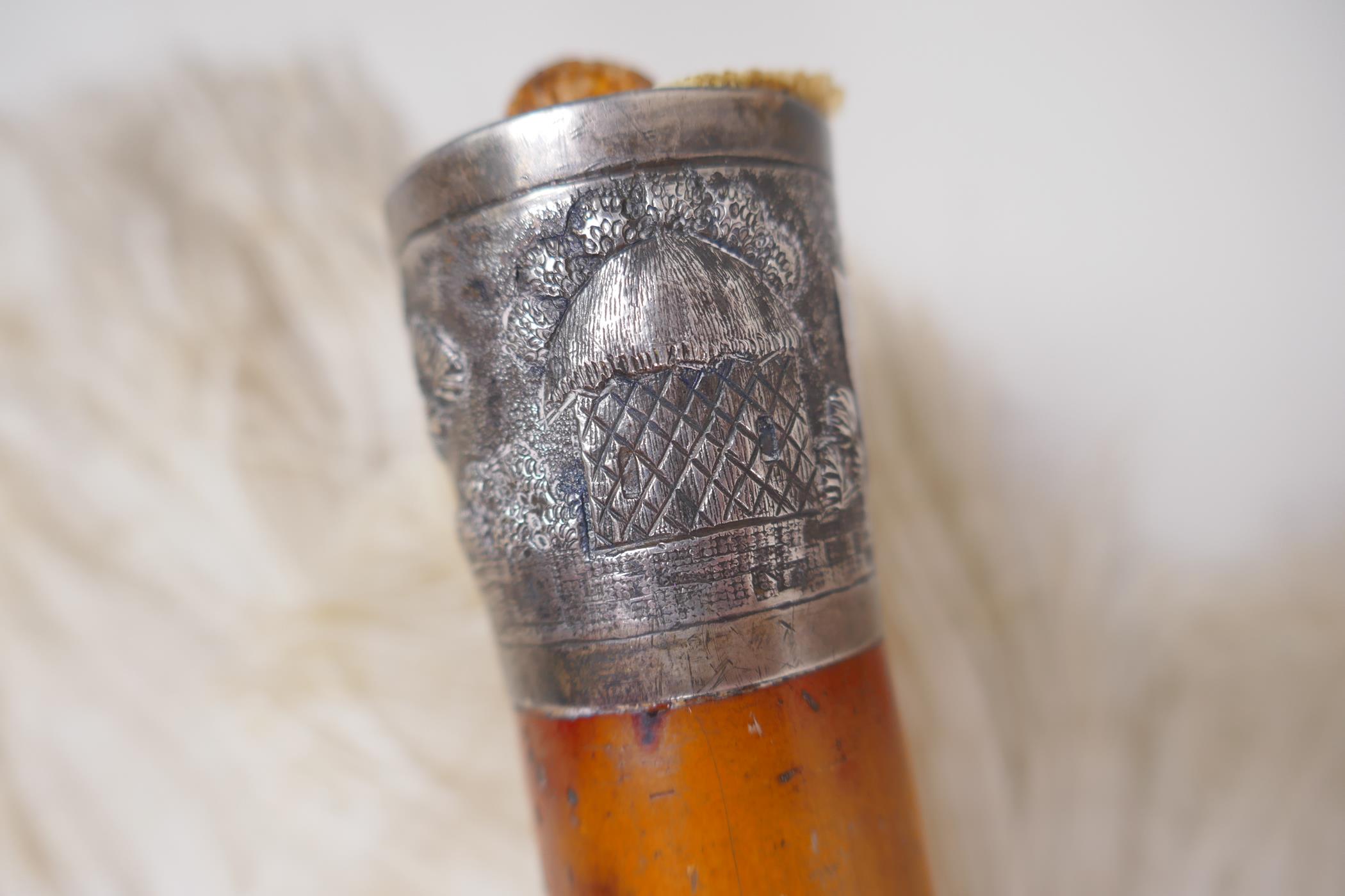 An ostrich feather fan with faux tortoiseshell blades, a malacca walking cane with oriental silver - Image 4 of 4