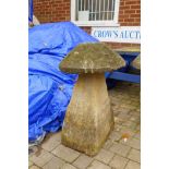 Antique saddle stone, 79cm high