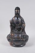 A Chinese patinated copper figure of Quan Yin, 28cm high