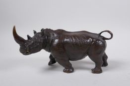 A filled bronze medal of rhinoceros, 23cm long