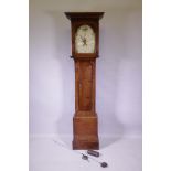 Early C19th Welsh oak longcase clock, with painted dial inscribed Stan? Jones, Lland...ry?, the