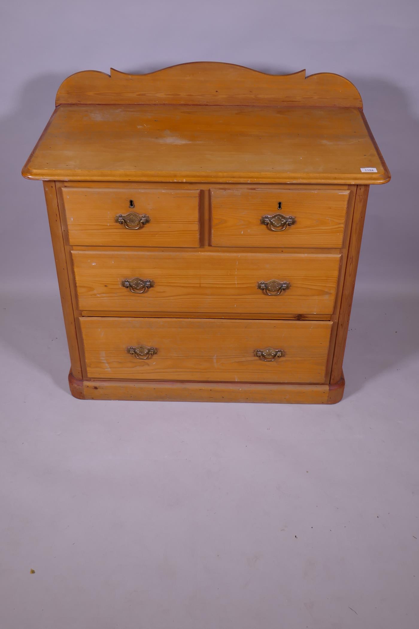 An Edwardian pine chest of two over two drawers, raised on a plinth base, 93 x 49 x 90cm - Image 2 of 3