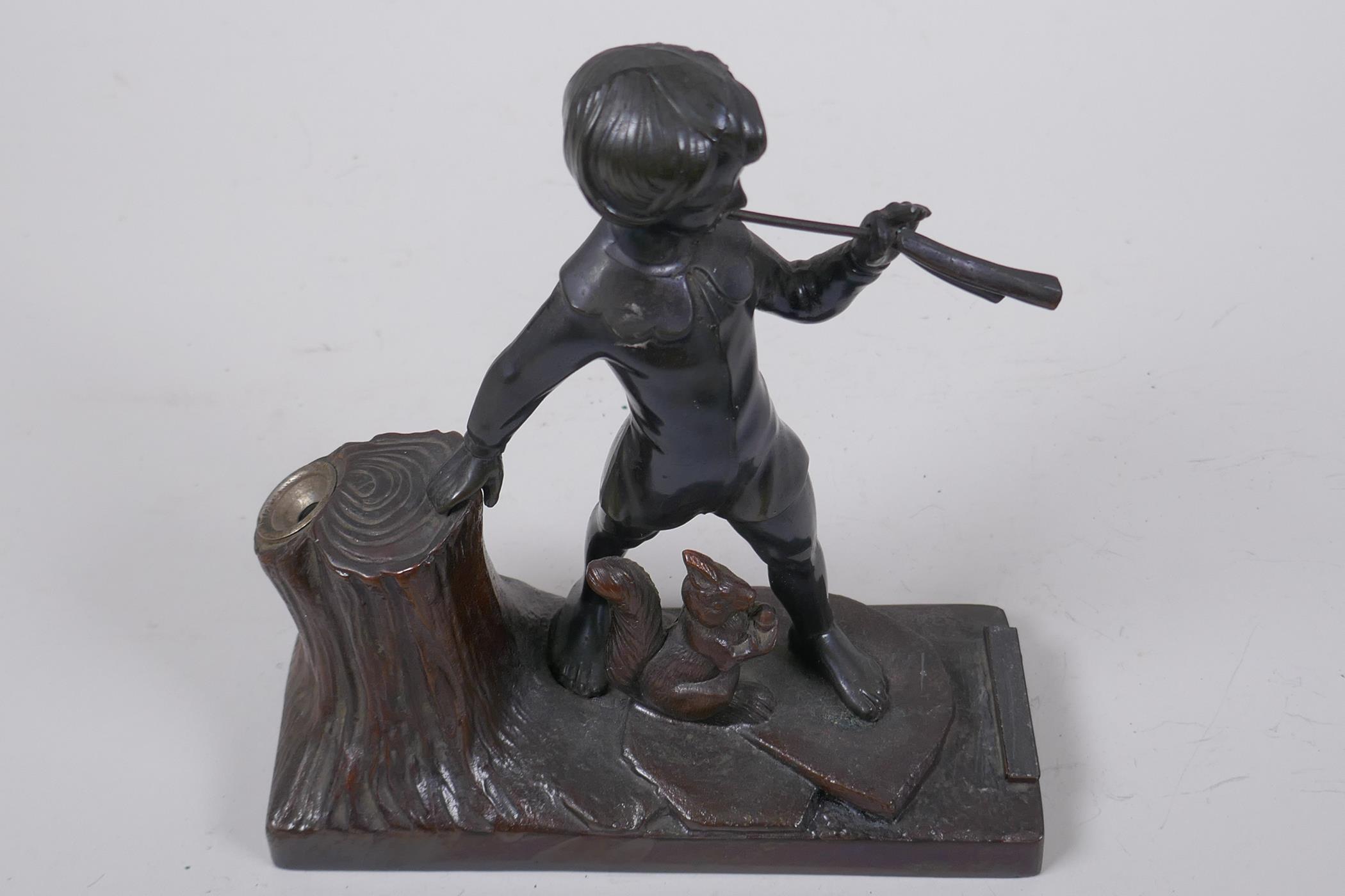 A spelter table top taper stand with striker, modelled as a boy piper and a squirrel, 17cm long - Image 4 of 4
