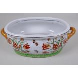 A Chinese porcelain foot bath painted with flowers, butterflies and fish in bright enamels, 43cm