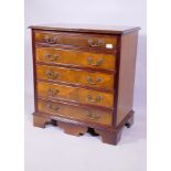 A five drawer walnut chest, 45 x 74 x 80cm