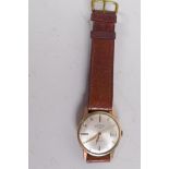 A gentleman's 9ct gold Rotary wristwatch with date window, silvered dial and gold batons and