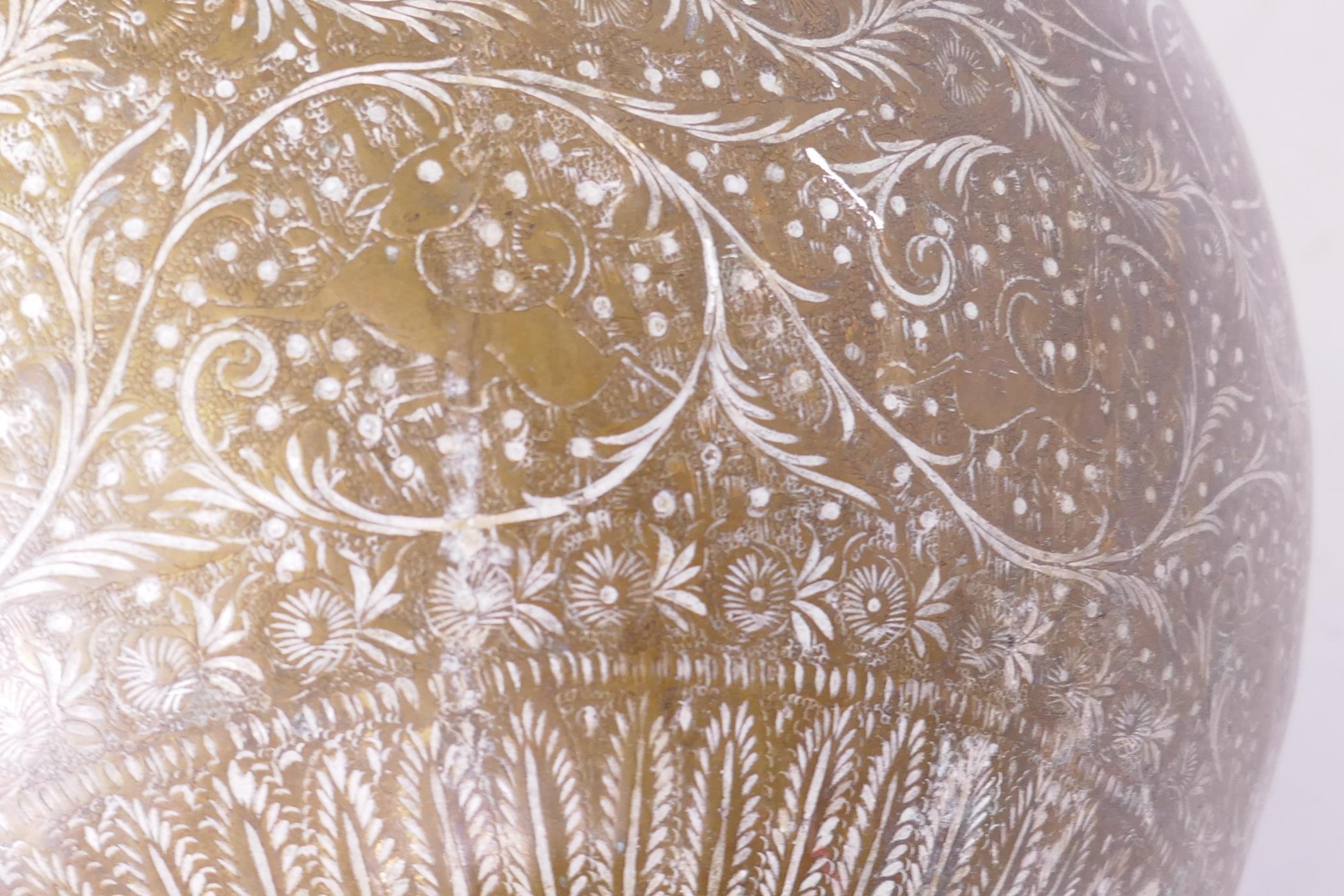 An antique Indian brass vase with engraved decoration of scrolling foliate designs and figures - Image 7 of 7