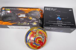 A remote control helicopter, The Nano Copter, in original box, the remote controlled Firefly in