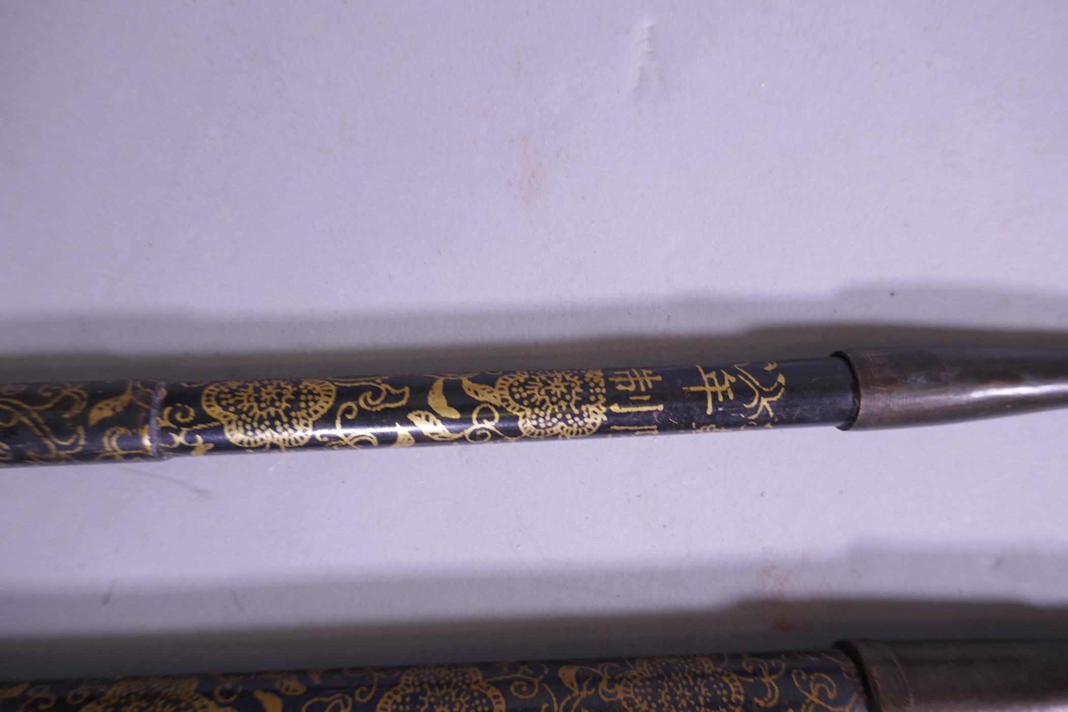 A Chinese opium pipe with gilt decorated shaft and another similar, 47cm long - Image 3 of 4