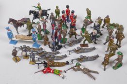 A collection of lead soldiers including Britains