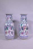 A pair of C19th Cantonese famille rose ceramic vases, on AF, repairs to neck, 62cm high