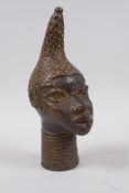 An African Benin bronze female head bust, 20cm high