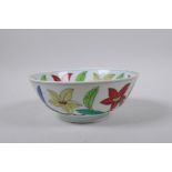 A polychrome porcelain bowl with scrolling floral decoration, Chinese Chenghua 6 character mark to