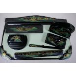 A chinoiserie lacquered seven piece desk set