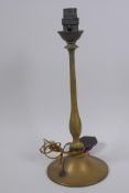 An Art Nouveau brass table lamp, 32cm high