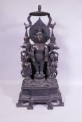 A Sino Tibetan bronze figure of Buddha flanked by acolytes, 6 character mark to front, 100cm high,