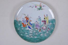 A C19th Chinese famille vert porcelain cabinet plate decorated with the eight immortals in flight