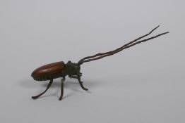 A Japanese Jizai style brone okimono beetle with articulated legs and antennae, 15cm long