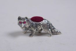 A sterling silver pin cushion in the form of a fox, 4cm long