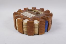 A vintage wooden gaming chip and card caddy, 24cm diameter