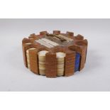 A vintage wooden gaming chip and card caddy, 24cm diameter