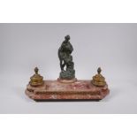 A C19th French rouge marble and ormolu desk set decorated with a bronze figure of Venus, 41cm long x