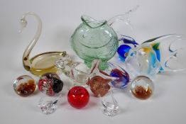 A quantity of glass fish, animals and paper weights, including Murano and Mats Jonnason