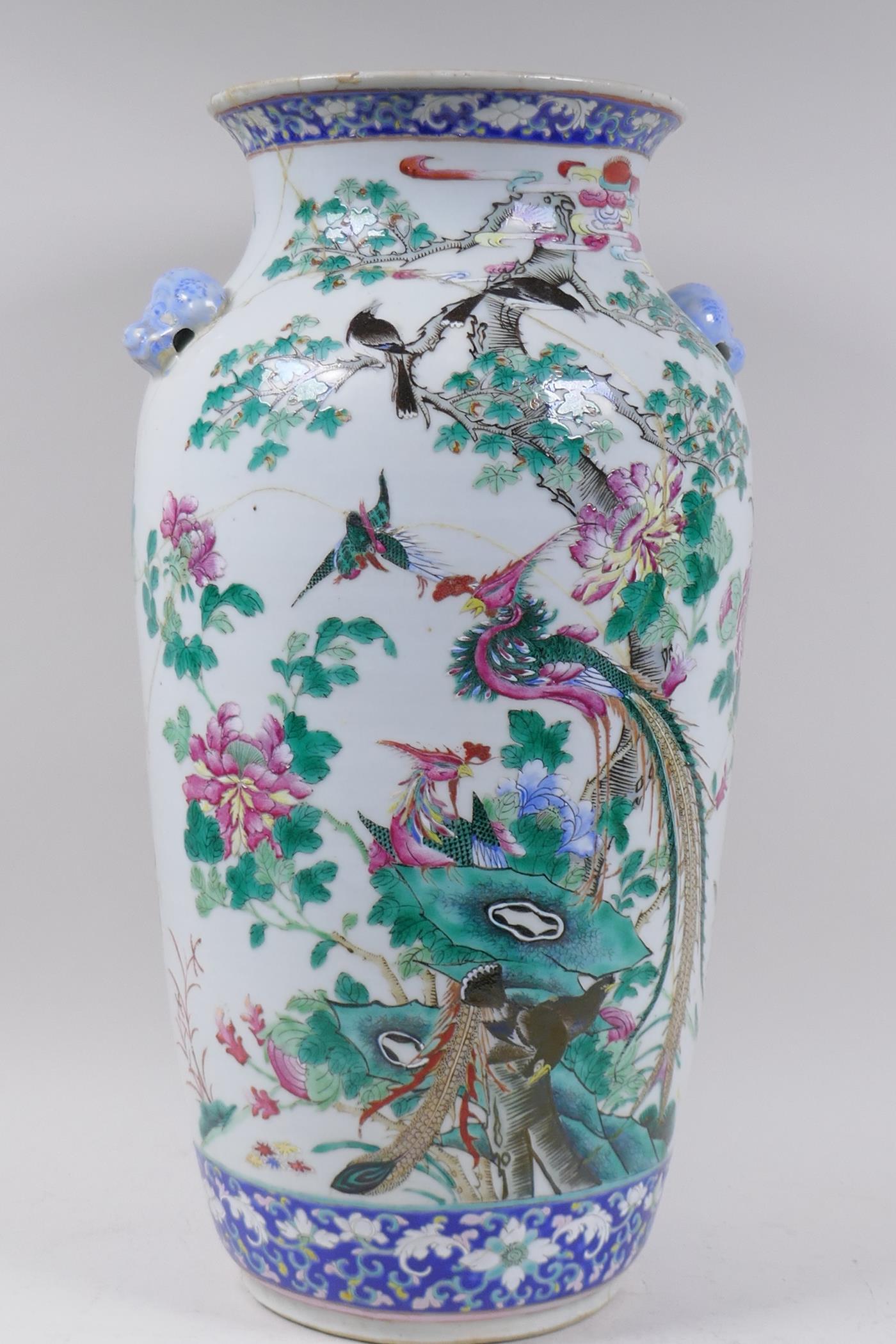 An antique Chinese vase with famille verte enamel decoration of peacocks and magpies, broken and