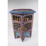 An Indian painted occasional table with pierced supports, 52cm high