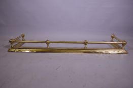 A Victorian brass fender, external 132 x 35cm