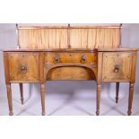 George III faded mahogany inverted breakfront sideboard, with ebony inlaid decoration, brass