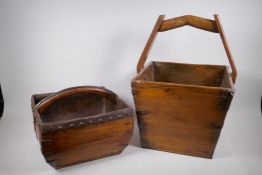 An antique Chinese elm rice bucket with iron reinforcements, and a similar elm rice measuring basket