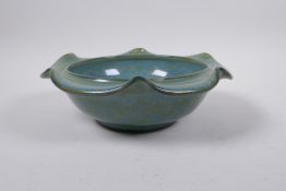 A Chinese celadon crackle glazed porcelain petal shaped bowl, character inscription to base, 23cm