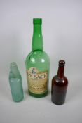 Three collector's bottles, a Charrington's Princes Brew Beer bottle with contents, a large Dry Sac