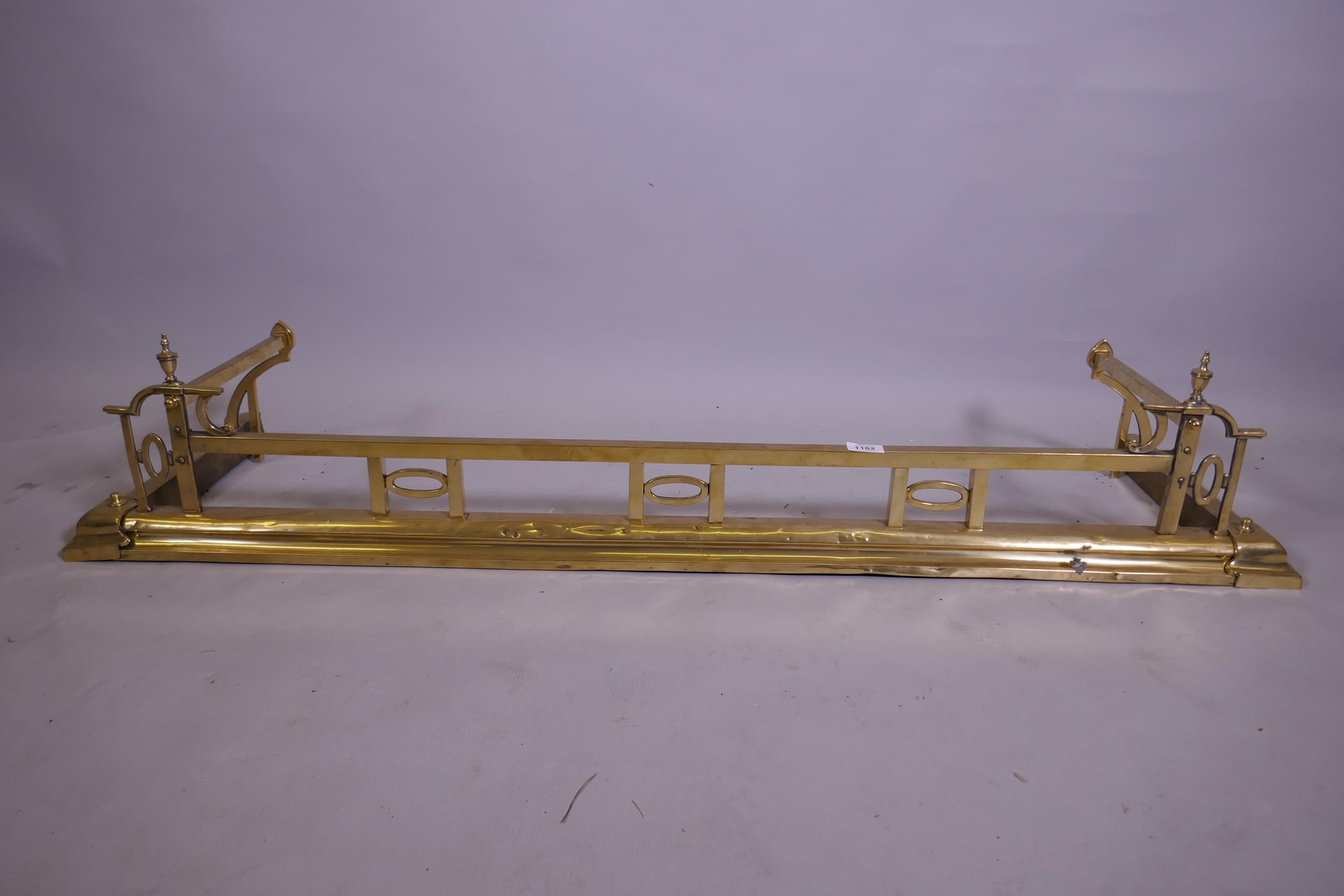 A Victorian brass fender, external 134 x 36cm