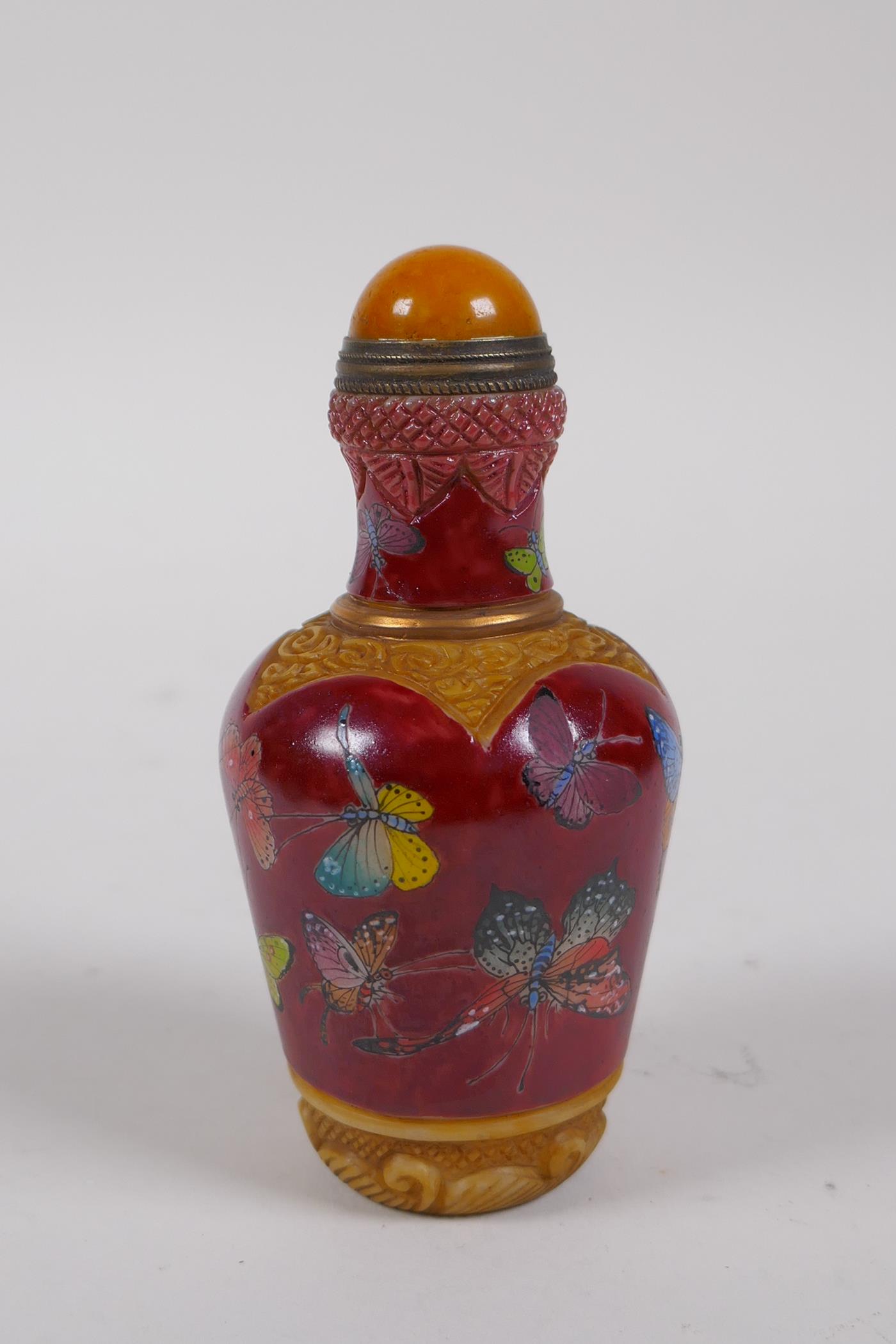 A Chinese moulded glass snuff bottle with enamelled butterfly decoration, 4 character mark to - Image 2 of 4
