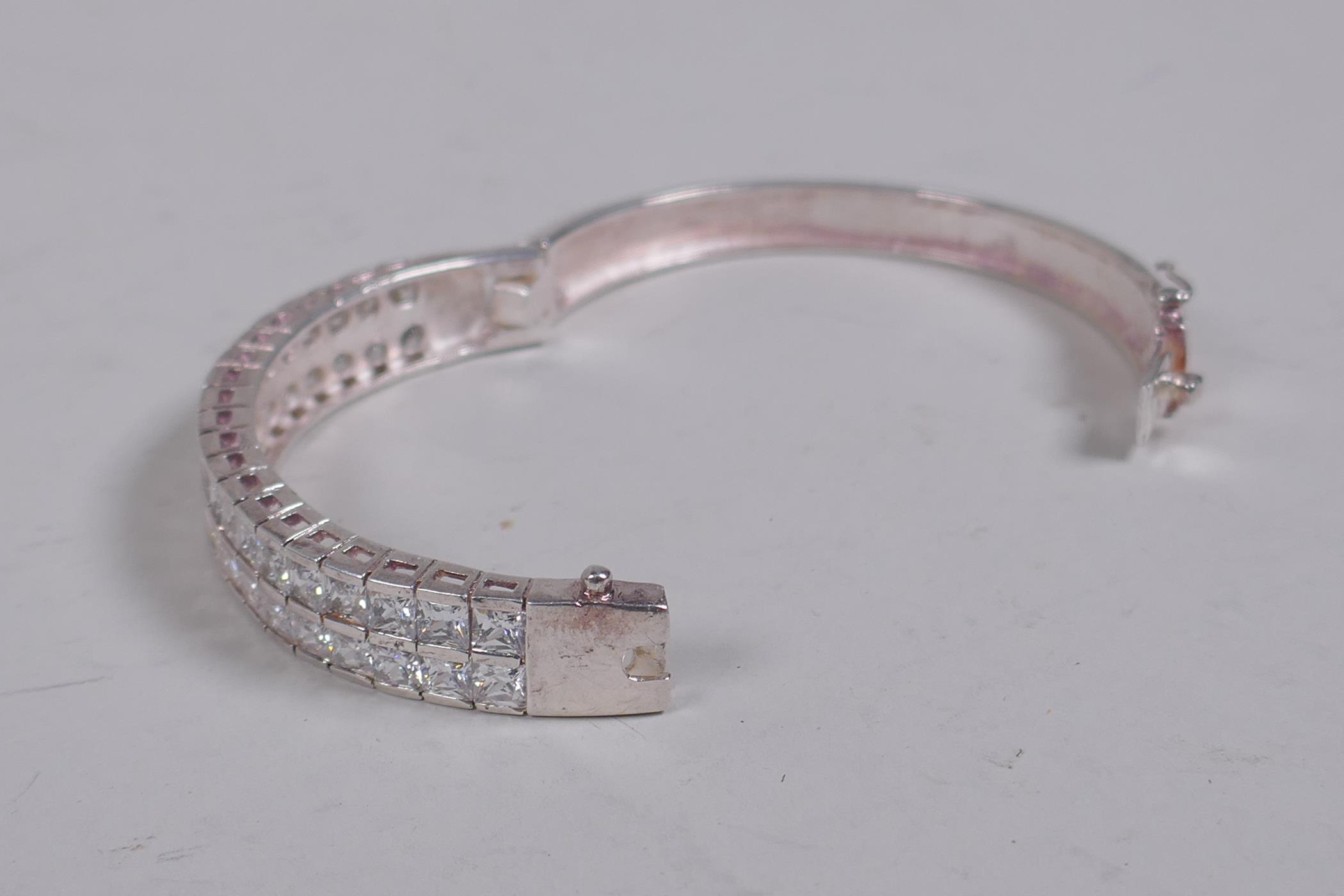 A silver and cubic zirconia set bangle, 6.5cm diameter - Image 2 of 2