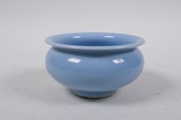 A Chinese baby blue glazed porcelain bowl, mark to base, 10cm diameter