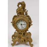 A French ormolu mantel clock, the case decorated with playing cherubs, the time piece movement