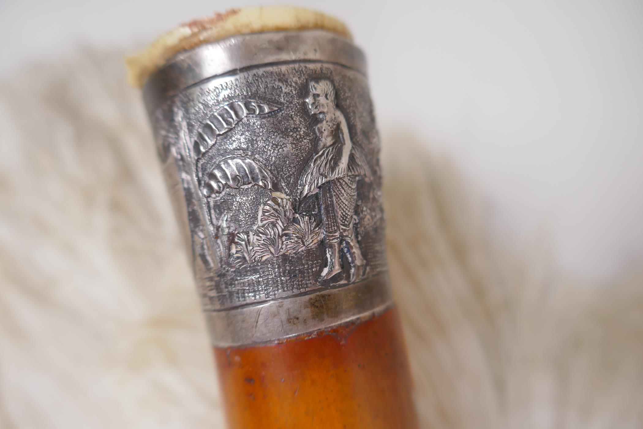 An ostrich feather fan with faux tortoiseshell blades, a malacca walking cane with oriental silver - Image 3 of 4