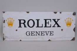 A retro enamel 'Rolex' sign, 24 x 60cm