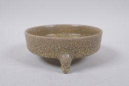A Chinese crackleware censer raised on tripod supports, 14cm diameter