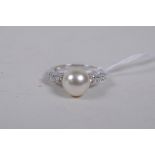 A 925 silver, cubic zirconia and freshwater pearl dress ring, size L
