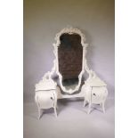 A painted dressing table with two pedestal cupboards and swing mirror