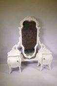 A painted dressing table with two pedestal cupboards and swing mirror