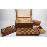 A chess set, draught board and draughts, a small two compartment tea caddy and a C19th oak desk