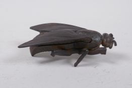 An antique cast iron fly ash tray by E.G. Zimmermann, AF, 12cm long