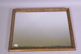 An antique framed wall mirror, 63 x 83cm